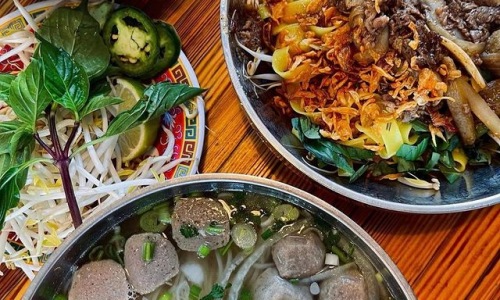 photo of assorted Asian meals on table